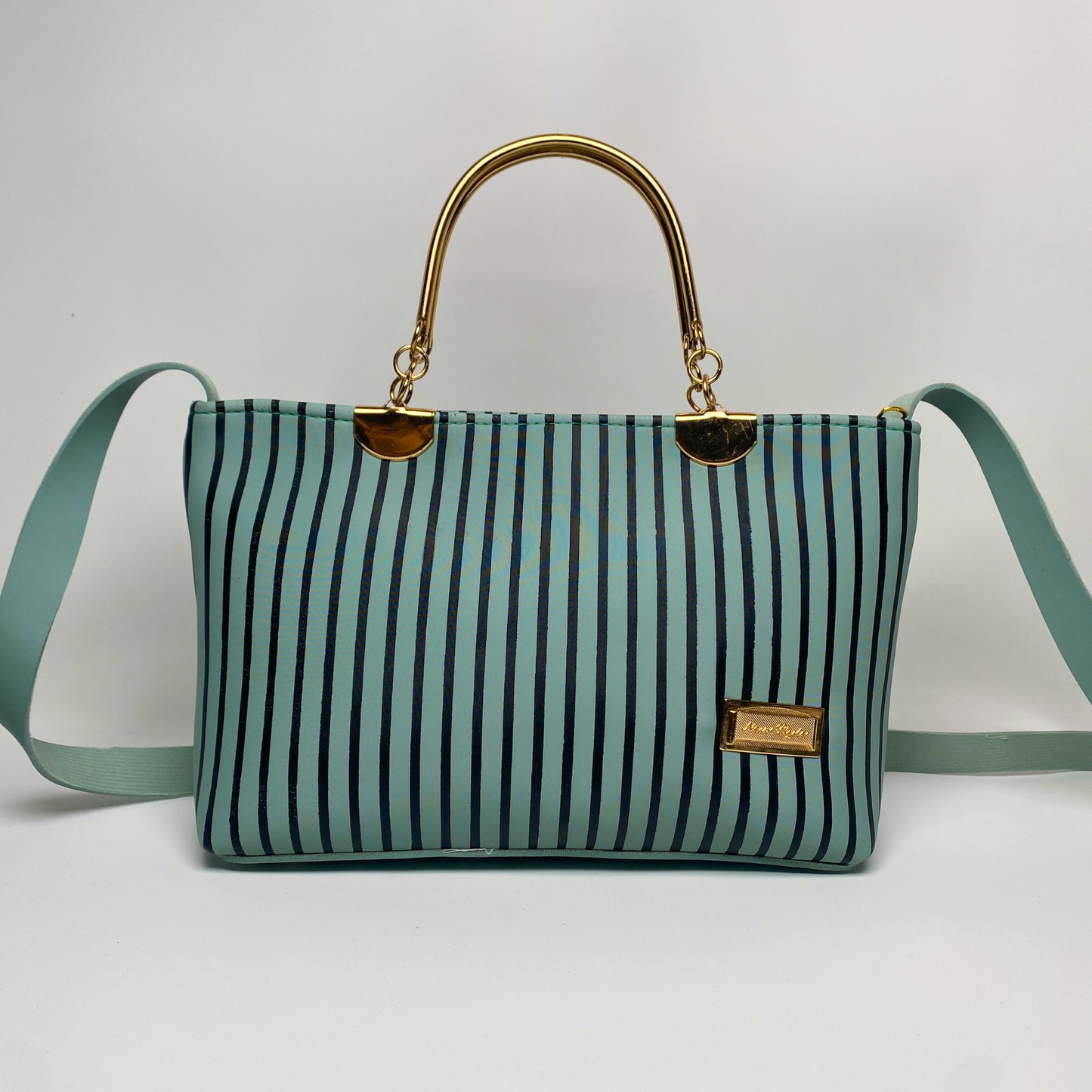 Elegant Striped Handbag with Gold Handles & Shoulder Strap